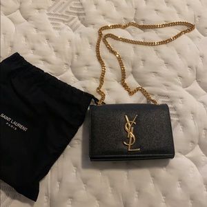 YSL CLUTCH BLACK AND GOLD